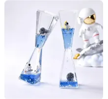 Uzay Temalı Dökülen Yağ Kum Saati